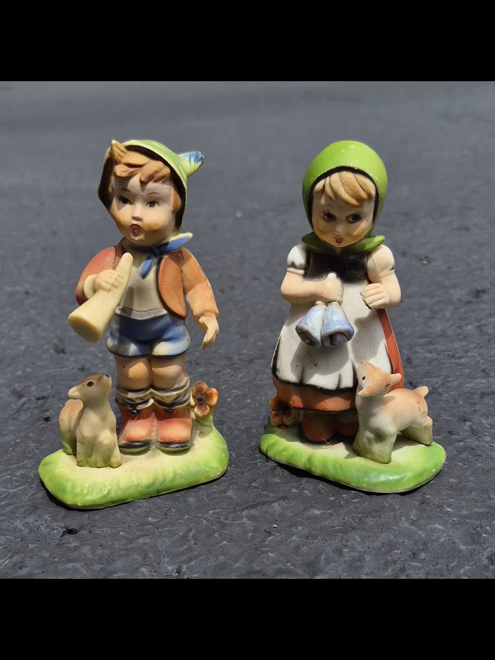 Hand-Painted Boy and Girl Figurine Set in Green, Orange and Cream